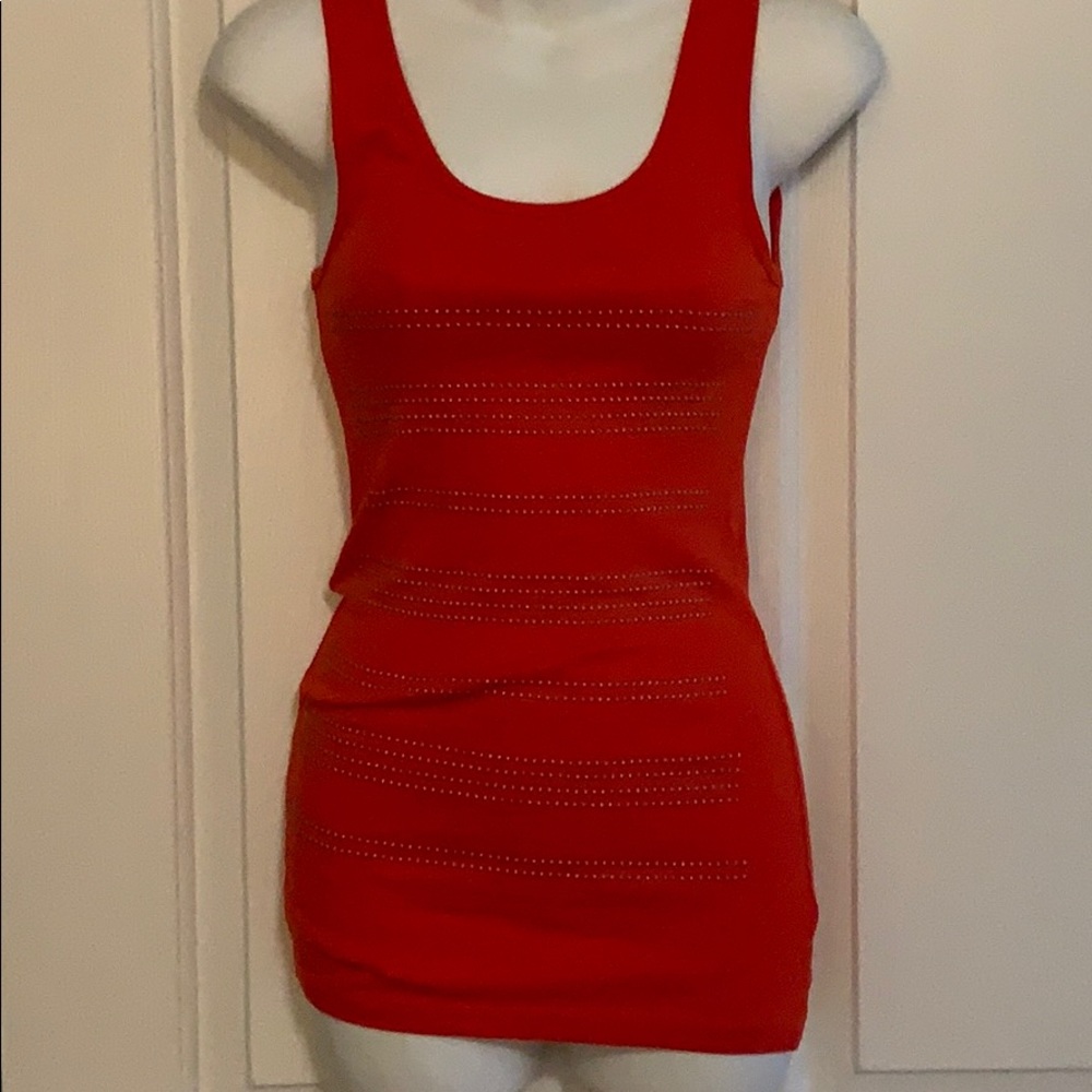 Orange tank with gold raised studs